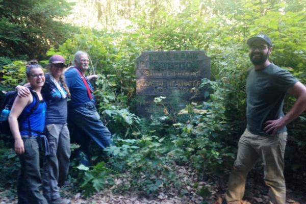 Group at Salmon Enhancement Project Sign in Mattole Headwaters